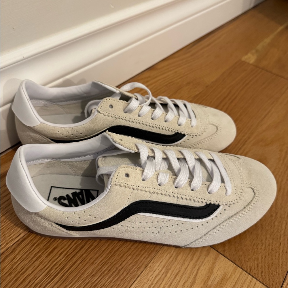 Vans women’s Cream and Black Sneakers
